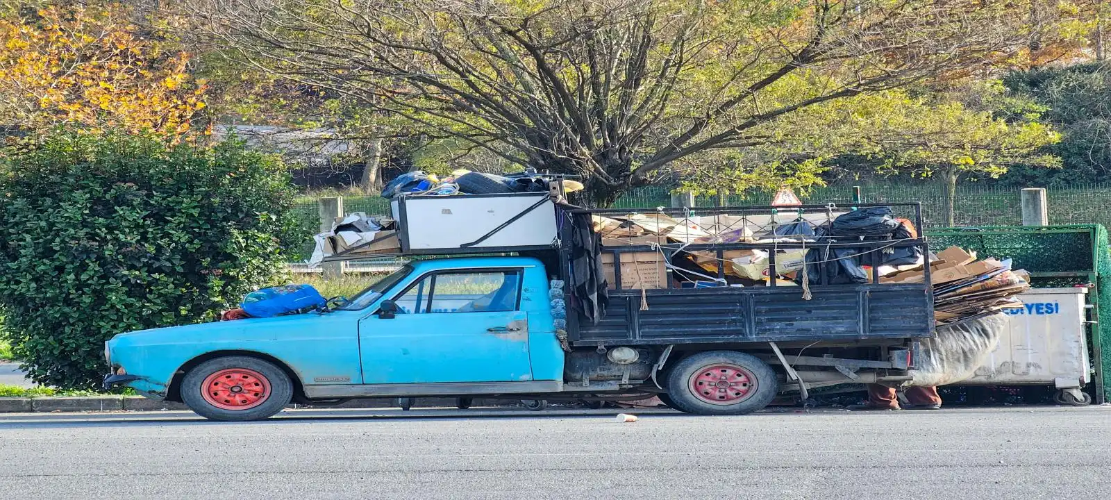 Blue truck loaded with household waste for rubbish removal Launceston TAS